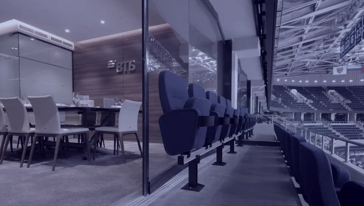 A hospitality box at VTB Arena: a set table and seats overlooking the court